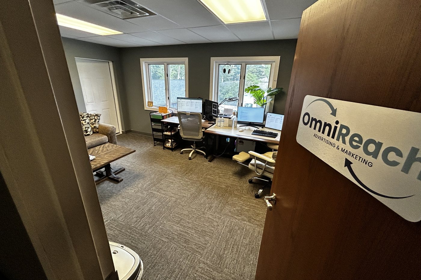 The OmniReach Media office door at 122 Western Ave Ste C in Akron, Ohio
