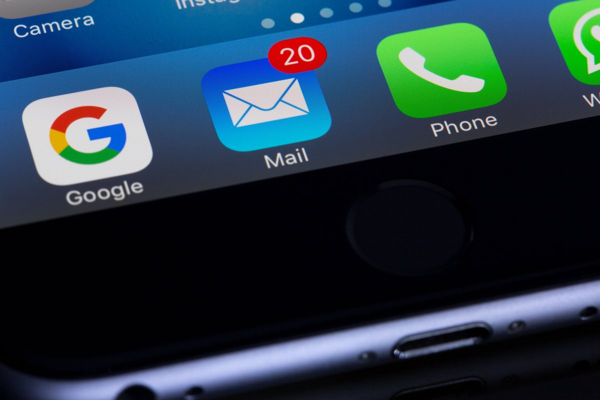 Phone home screen showing unread mail notifications from an email campaign