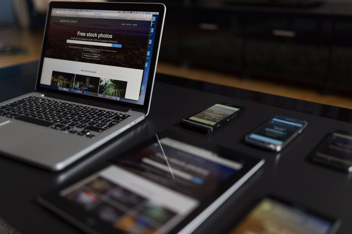 Laptop, tablet and phones showing a responsive website built by OmniReach Media